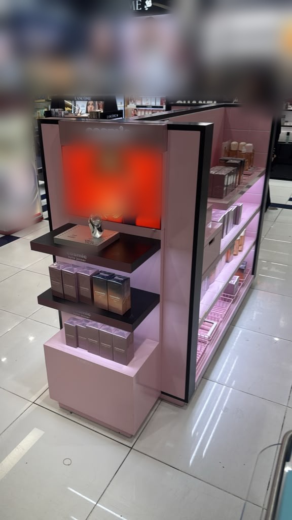 Side elevation showing the illuminated display bay and the finished cabinet base.