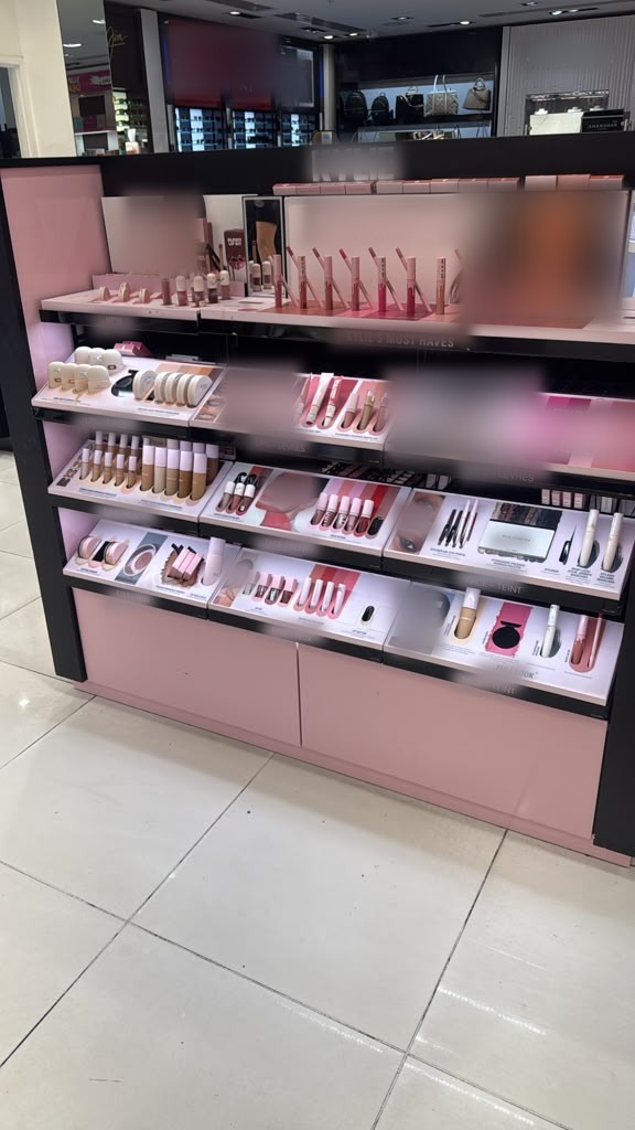 Front display wall with level shelving, even lighting and consistent panel joints.